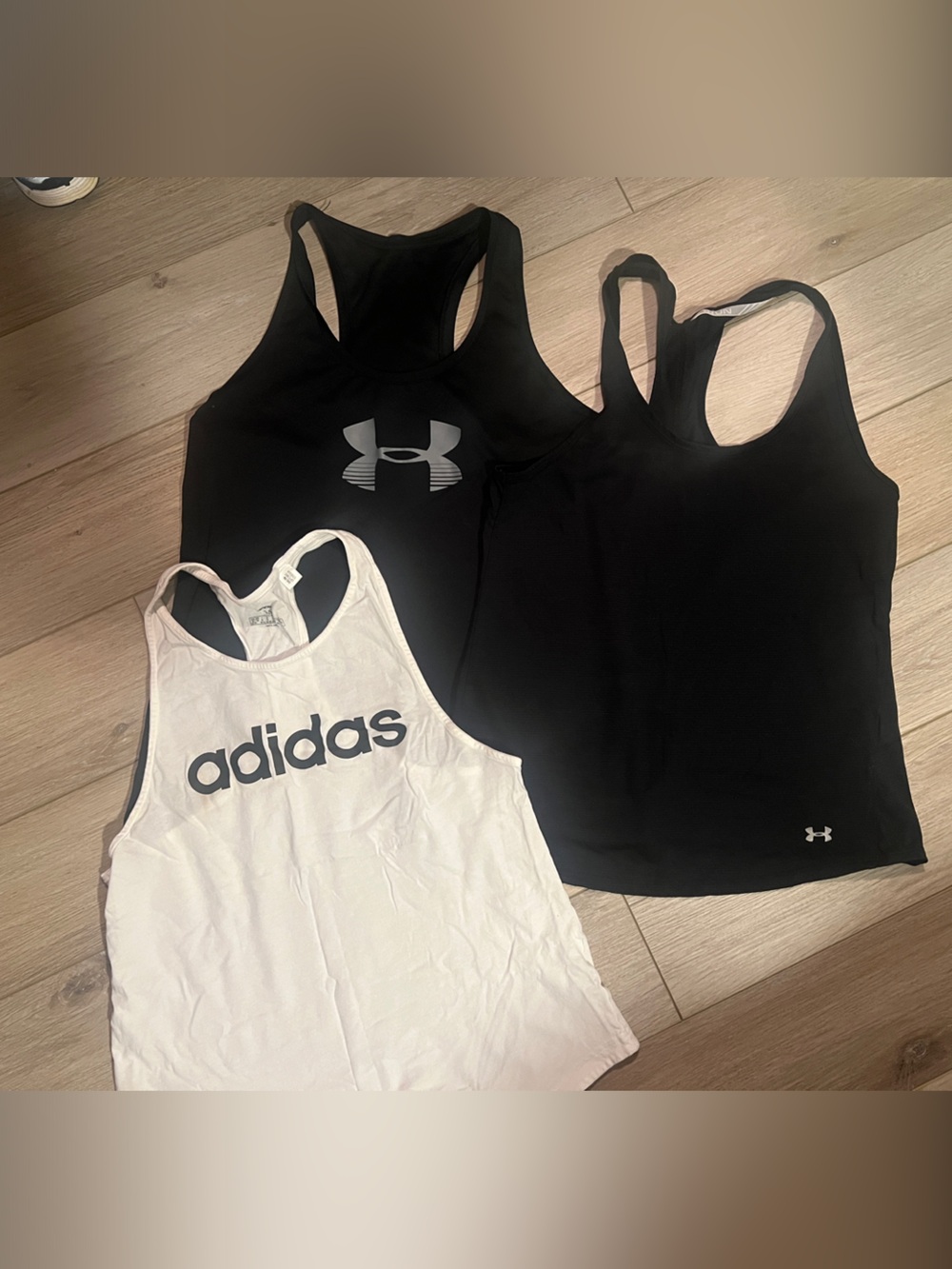Under Armour Black Racerback Tank Top with Silver Logo